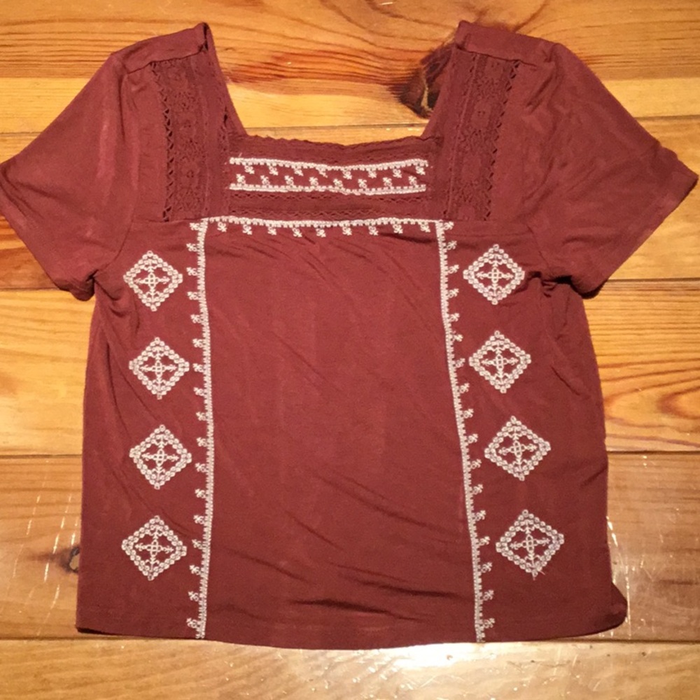 American Eagle surface shirt. Embroidered in  the front.